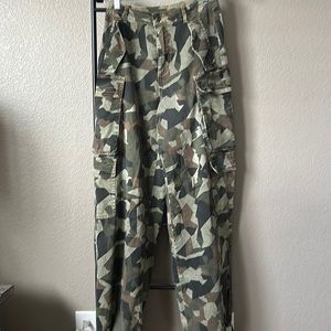Cargo pants camo with 4 cute big pockets on sides they are baggy.